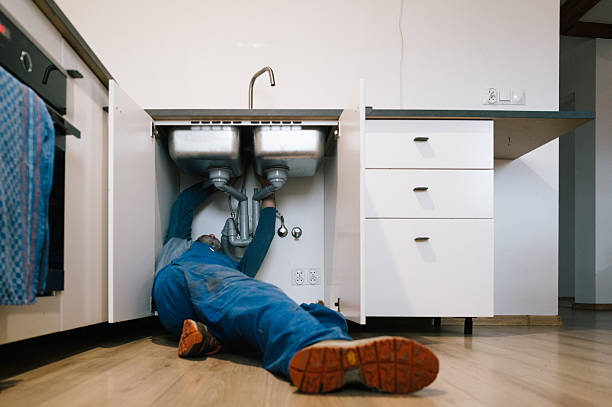 Professional Emergency Plumber technician working in Berlin, NH